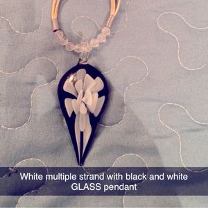 White fabric strands for necklace with black and white GLASS pendant.